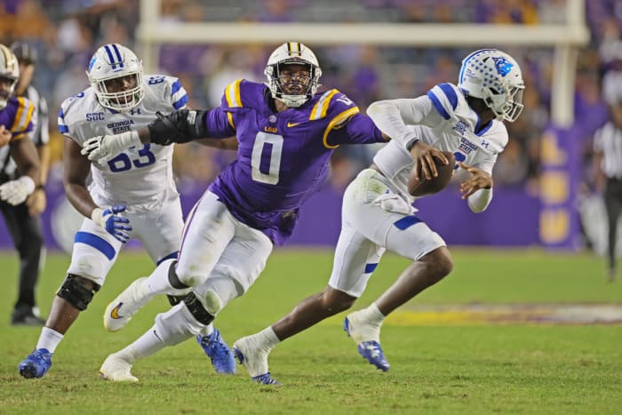 Nov 18, 2023; Baton Rouge, Louisiana, USA; LSU Tigers defensive tackle Maason Smith (0) pressures Georgia State Panthers quarterback Darren Grainger (3) in third quarter action at Tiger Stadium.